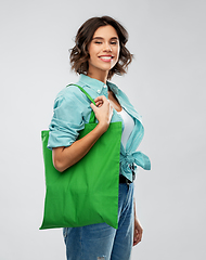 Image showing woman with reusable canvas bag for food shopping