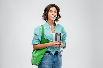 Image showing woman with bag for food shopping and tumbler