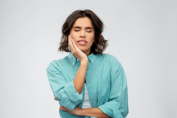 Image showing young woman suffering from toothache