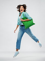 Image showing woman with reusable canvas bag for food shopping