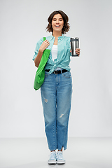 Image showing woman with bag for food shopping and tumbler