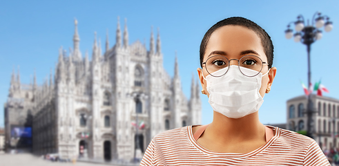 Image showing woman in medical mask over milano cathedral, italy