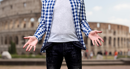 Image showing close up of man showing empty pockets in italy