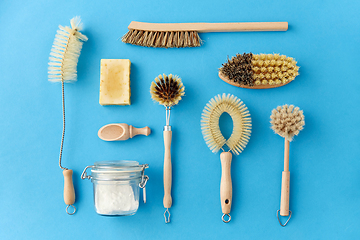 Image showing cleaning brushes and soda powder with scoop in jar