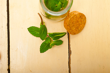 Image showing fresh mint leaves on a glass jar