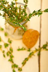 Image showing fresh thyme on a glass jar