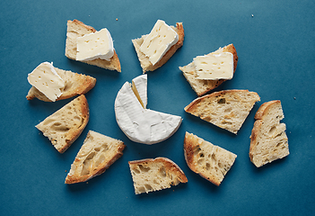 Image showing toasted bread slices and brie cheese