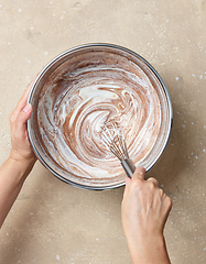 Image showing chocolate cake dough making process