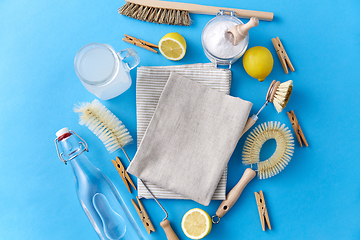 Image showing vinegar, lemons, soda, clothespins and brushes