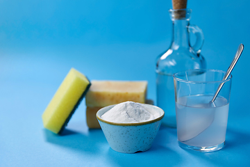 Image showing washing soda, sponge, soap, vinegar and glass