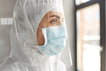 Image showing doctor in protective wear, mask and face shield