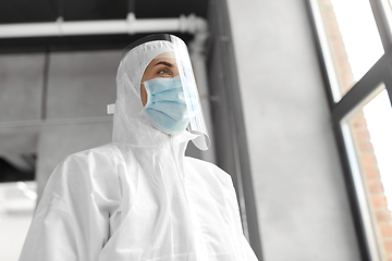 Image showing doctor in protective wear, mask and face shield