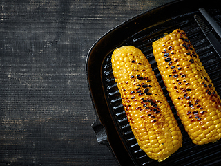 Image showing grilled corn on pan 