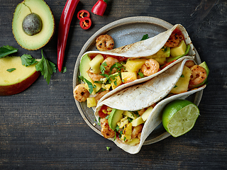 Image showing Mexican food Tacos isolated on wood background