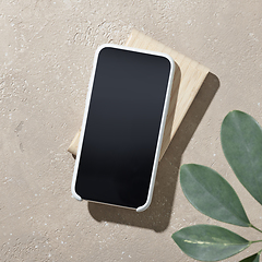 Image showing smartphone on beige color table top