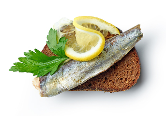 Image showing canned sardine on bread slice