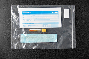 Image showing beaker with test, cotton swab and medical report