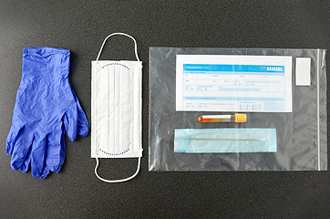 Image showing test tube, medical report, gloves and mask