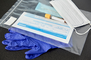 Image showing test tube, medical report, gloves and mask