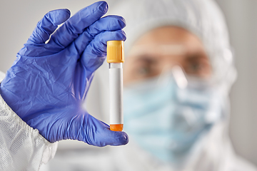 Image showing scientist in protective mask with test tube