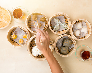 Image showing Top view of eating dim sum