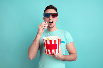 Image showing Caucasian young man\'s portrait on blue studio background