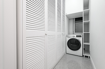 Image showing White utility room with wardobe in new apartment