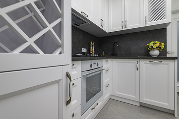 Image showing Luxury well designed modern black and white kitchen