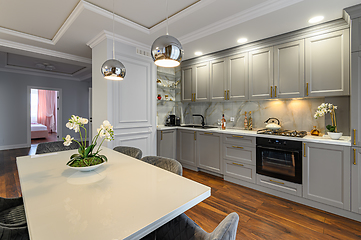 Image showing Luxury grey and white modern kitchen and living room