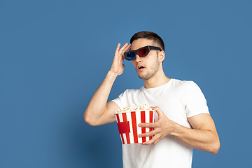 Image showing Caucasian young man\'s portrait on blue studio background