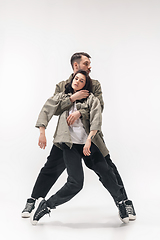 Image showing Trendy fashionable couple isolated on white studio background