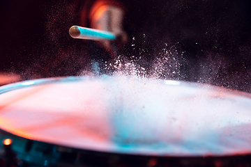 Image showing Drummer\'s rehearsing on drums before rock concert. Man recording music on drumset in studio