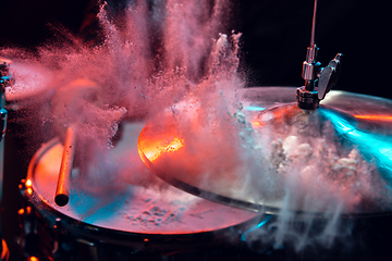 Image showing Drummer\'s rehearsing on drums before rock concert. Man recording music on drumset in studio