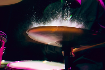 Image showing Drummer\'s rehearsing on drums before rock concert. Man recording music on drumset in studio