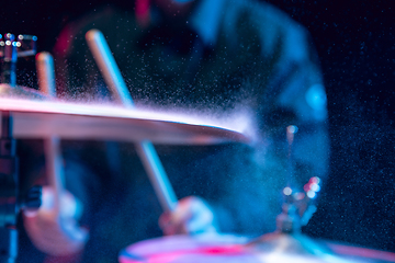 Image showing Drummer\'s rehearsing on drums before rock concert. Man recording music on drumset in studio