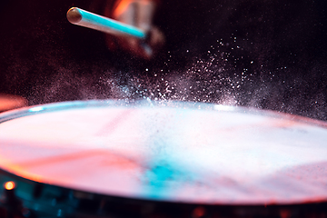 Image showing Drummer\'s rehearsing on drums before rock concert. Man recording music on drumset in studio