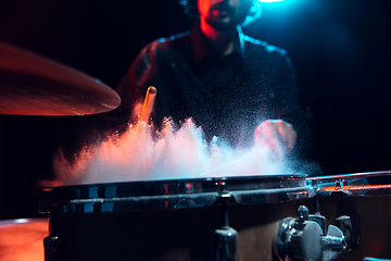 Image showing Drummer\'s rehearsing on drums before rock concert. Man recording music on drumset in studio