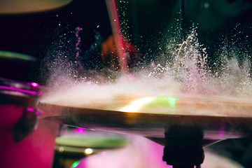 Image showing Drummer\'s rehearsing on drums before rock concert. Man recording music on drumset in studio