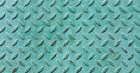 Image showing Old metal diamond plate covered with green paint