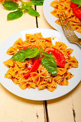 Image showing Italian pasta farfalle butterfly bow-tie and tomato sauce