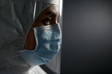 Image showing doctor in protective wear, mask and face shield