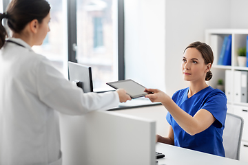 Image showing doctor and nurse with tablet computer at hospital