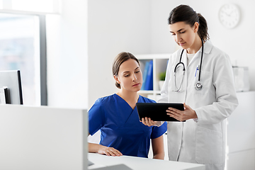 Image showing doctor with tablet computer and nurse at hospital