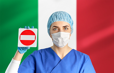 Image showing italian doctor or nurse in mask showing stop sign