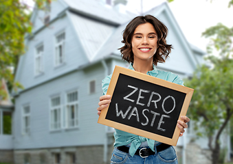 Image showing happy woman with chalkboard with zero waste words