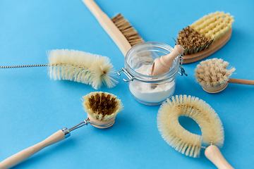 Image showing cleaning brushes and soda powder with scoop in jar