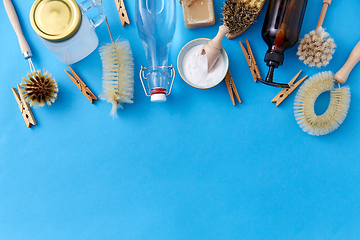 Image showing soda, vinegar, clothespins, soap and brushes