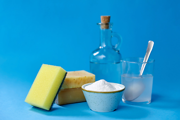 Image showing washing soda, sponge, soap, vinegar and glass