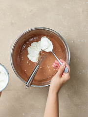 Image showing chocolate cake dough making process