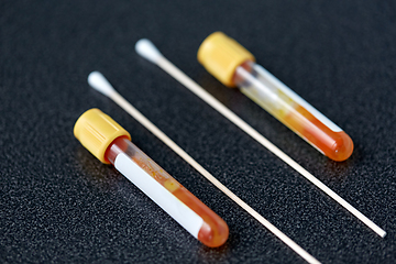 Image showing test tubes with blood plasma and cotton swabs